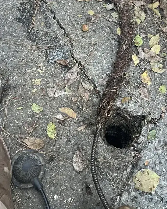 Sewer cleanout with an inspection cable on a Jeff's Plumbing job