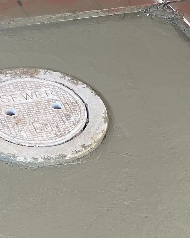 Sewer cleanout set in new concrete