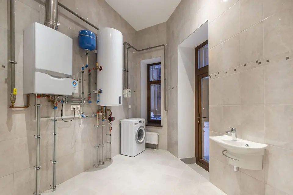 Wall-mounted water heaters in a utility room